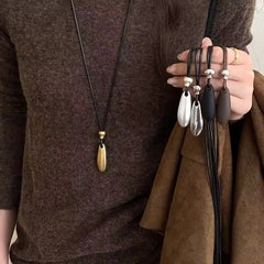 Ingvn Metal Water Drop Shaped Pendant Necklace for Women Girls Simple Black Rope Adjustable Long Sweater Chain Fashion Accessory
