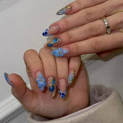 Ingvn 24Pcs Press on False Nails with Flower Design Blue Leopard Print French Almond Fake Nails Detachable Oval Finished Nail Art Tips