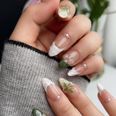 Ingvn 24Pcs 3D Shell Pattern Press on False Nails with Green Camellia Design Short Round Head Wearable Almond French Fake Nail Set