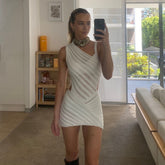 Summer cross-border explosion design sense stitching oblique shoulder hollow perspective solid color sexy knitted dress women's clothing