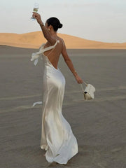 Elegant White Satin Backless Maxi Dress Women Sexy Sleeveless Spaghetti Strap Flower Decor Robe Night Club Party Dresses