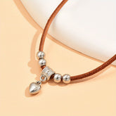 1pc Exquisite Bohemian Heart-Shaped Leather Rope Pendant Necklace - Vintage-Inspired Bead Decor, Stylish Vacation Accessory for Women, Unique Gift Idea, Adjustable Length, Nickel-Free Clasp