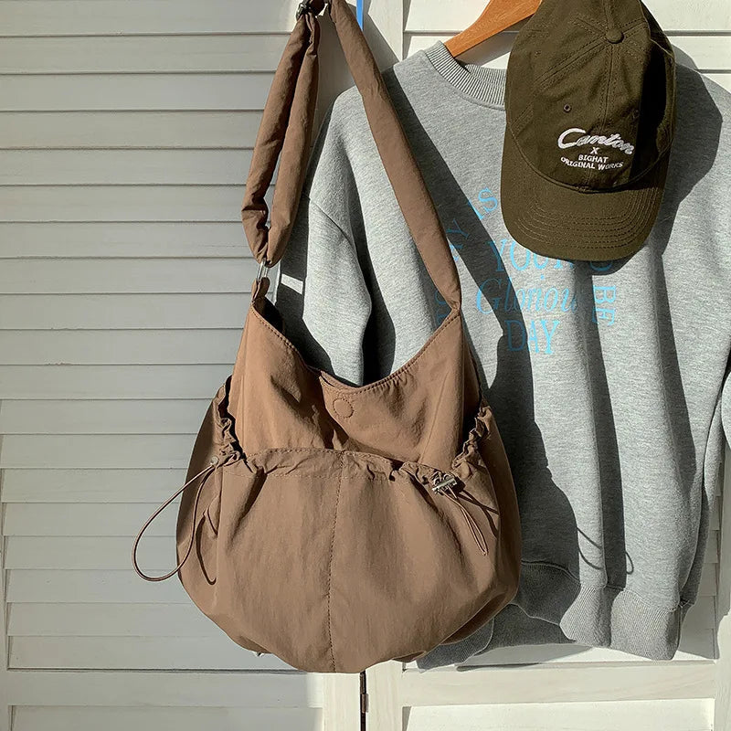 Ingvn  New Folded Nylon Crossbody Bag Fashionable Korean Edition Casual Style Shoulder Bag Shrink Large Capacity Commuter Folded Bag