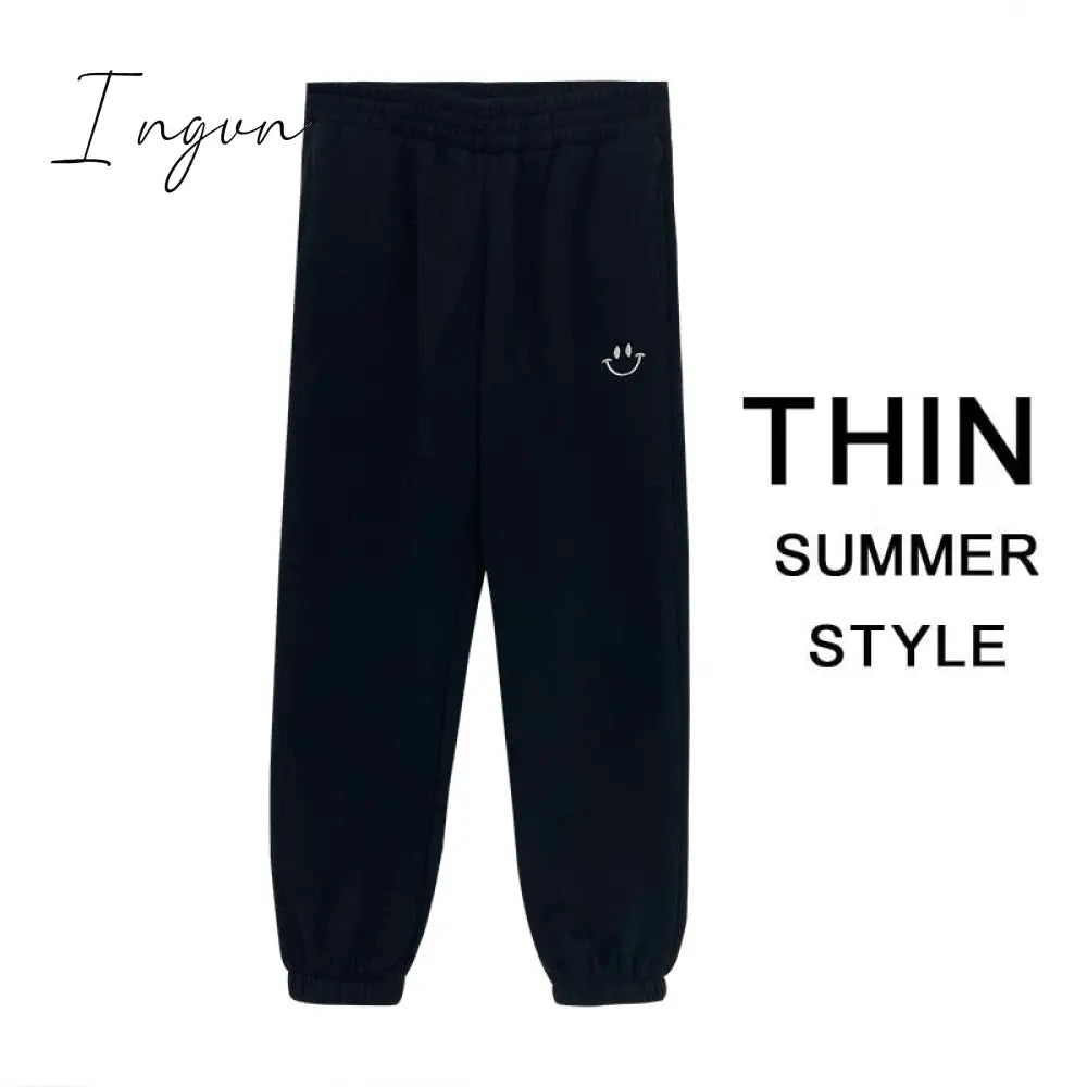 Ingvn - Smiley Face Embroidery Sweatpants