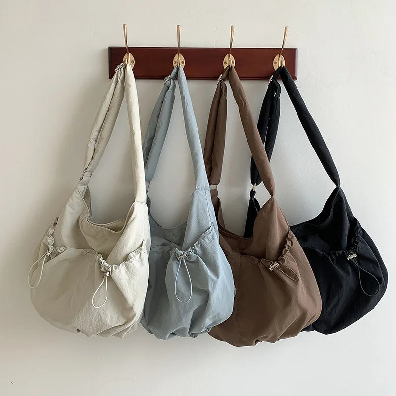 Ingvn  New Folded Nylon Crossbody Bag Fashionable Korean Edition Casual Style Shoulder Bag Shrink Large Capacity Commuter Folded Bag