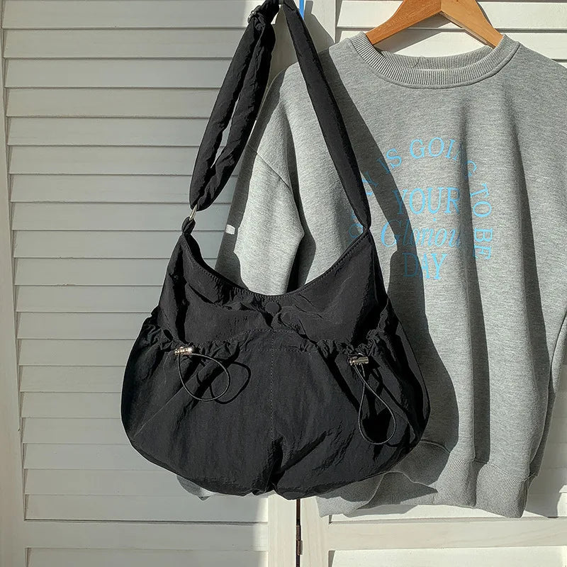 Ingvn  New Folded Nylon Crossbody Bag Fashionable Korean Edition Casual Style Shoulder Bag Shrink Large Capacity Commuter Folded Bag