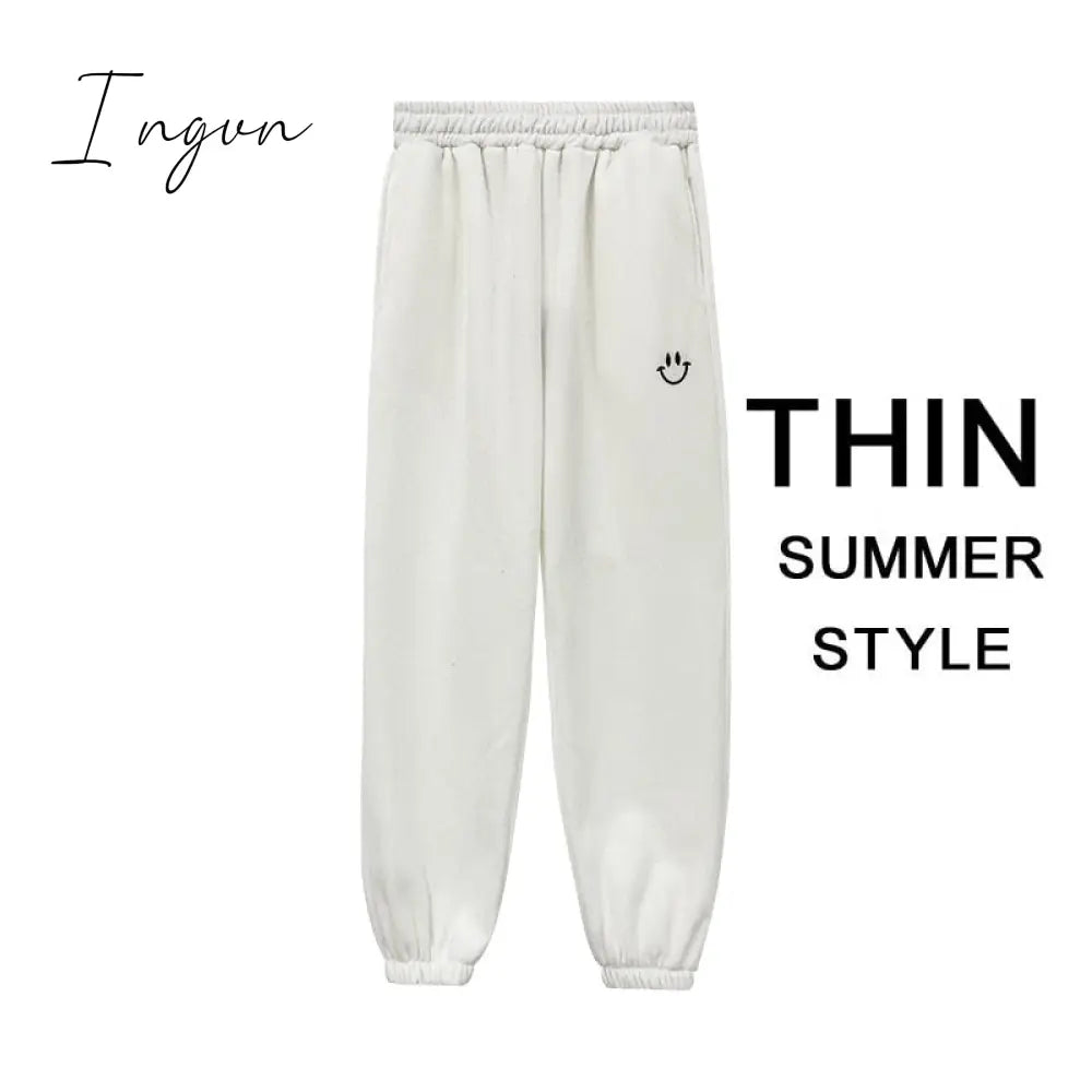 Ingvn - Smiley Face Embroidery Sweatpants