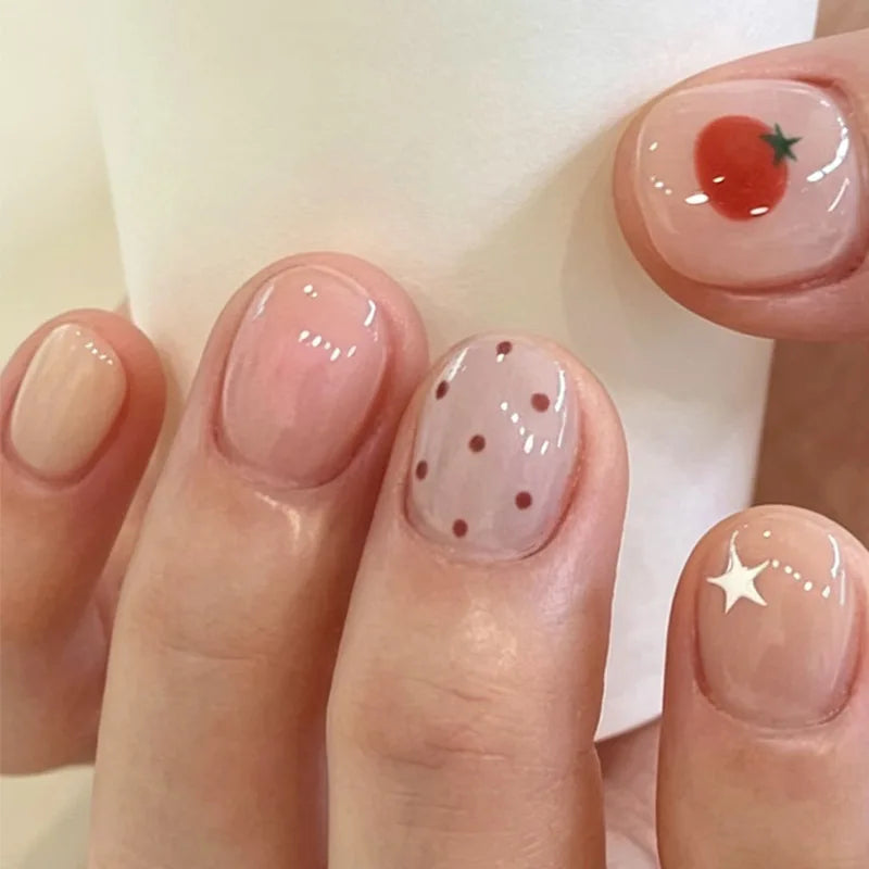Ingvn  24Pcs Summer Peachy Pink Nail Tips with Star Design Short Round Head Press on Fake Nails Cute Almond Style Wearable False Nails
