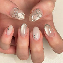 Ingvn  24Pcs Cat's Eye Design Fake Nail with Pearl Short Round Head Press on False Nails Silver French Bow Pattern Full Cover Nail Tips