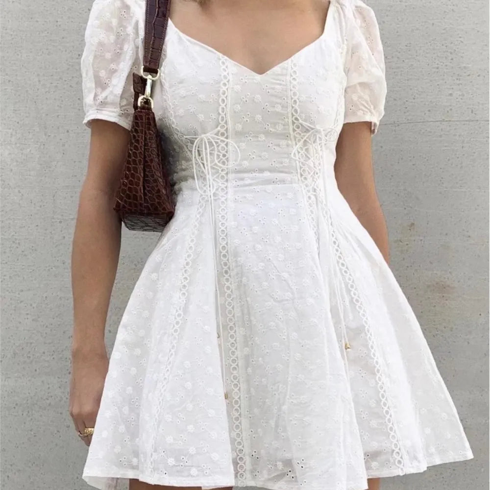 Ingvn  Sweet White Embroidery Hole Stitching Lace Cross Lacing up Short Puff Sleeve Dress Woman French Mini Dresses Holiday Robe