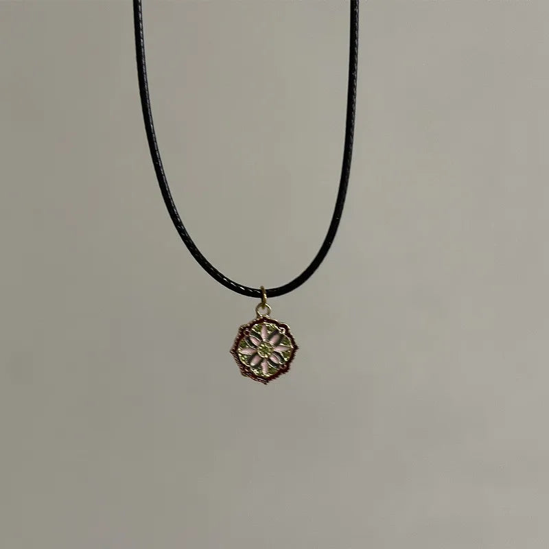 Ingvn  Vintage Drip Oil Flower Sun Pendant Necklace with Leather Rope Unique Antique Style Jewelry Accessory