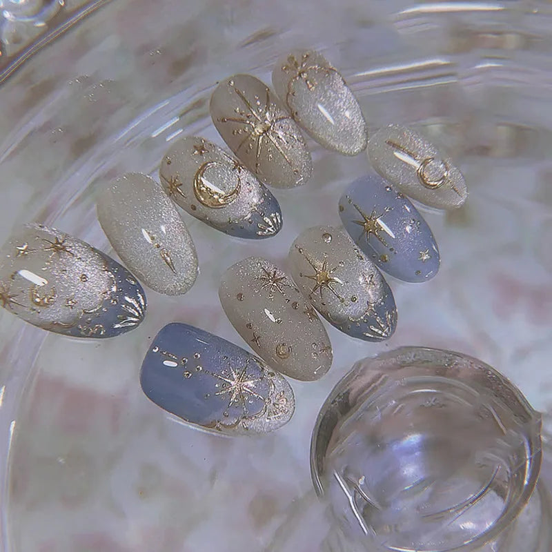 Ingvn  24Pcs Glitter Blue French False Nails Press on Short Round Head Fake Nail with Moon Star Design Artifical Almond Manicure Tips