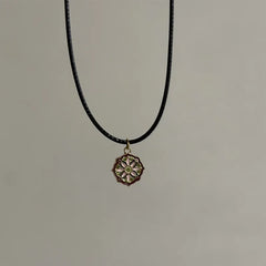 Ingvn  Vintage Drip Oil Flower Sun Pendant Necklace with Leather Rope Unique Antique Style Jewelry Accessory