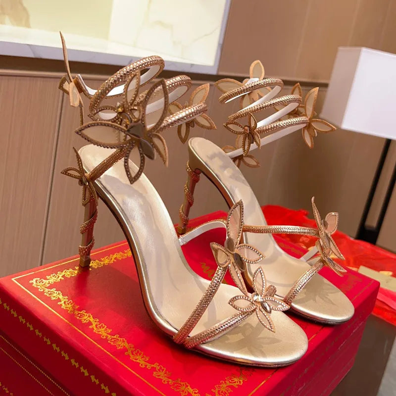 Ingvn  Luxury Crystal Embellished Butterfly Detail Women Sandals Sexy Coiled Strap Thin High heels Gladiator sandals Summer Party Shoes
