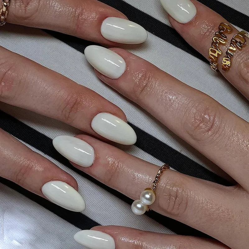 Ingvn  24Pcs Simple Green French False Nails Short Almond Fake Nails with Wave Line Design Wearable Round Head Press on Nail Tips