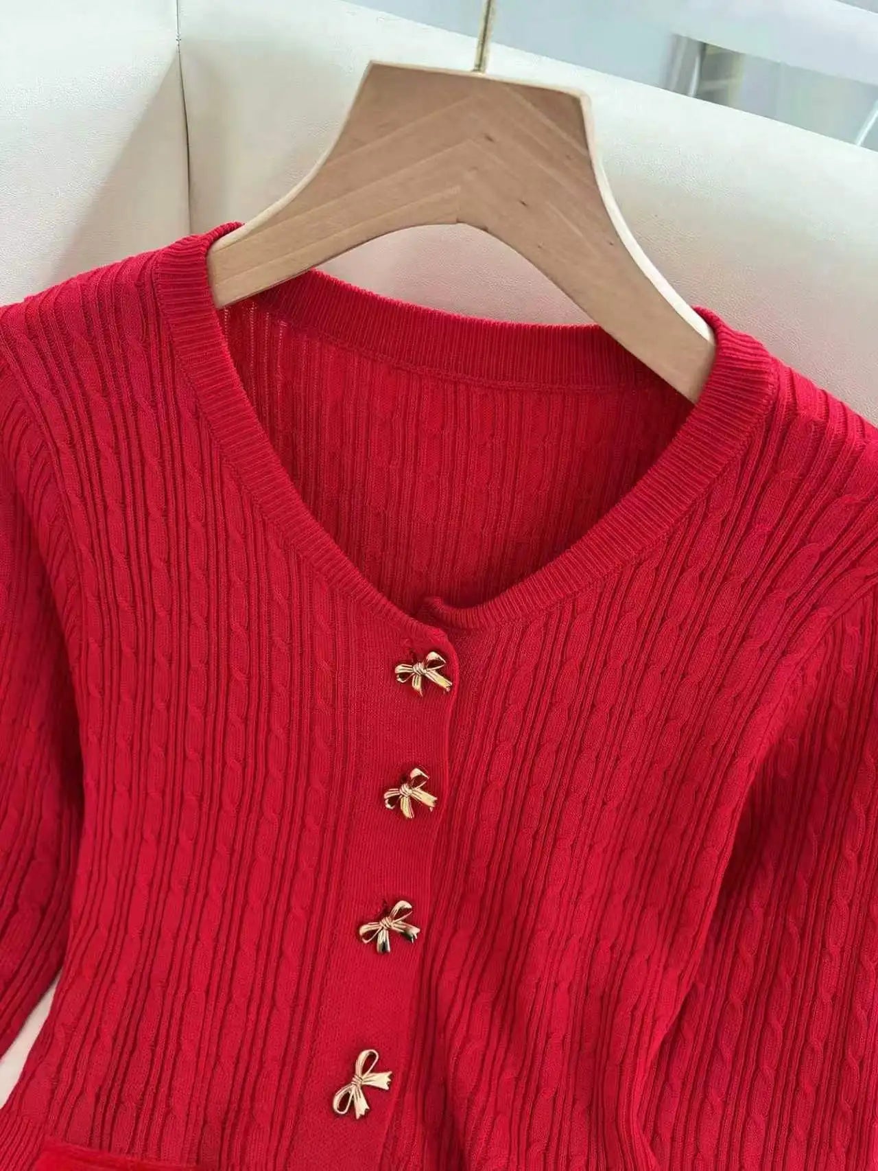 Ingvn - Women V‑Neck Knit Cardigan Bow‑Shaped Metal Buttons Peplum Hem Long‑Sleeve Slim‑Fit Cable Knit Sweater With Pockets