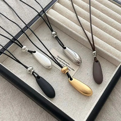 Ingvn  Metal Water Drop Shaped Pendant Necklace for Women Girls Simple Black Rope Adjustable Long Sweater Chain Fashion Accessory