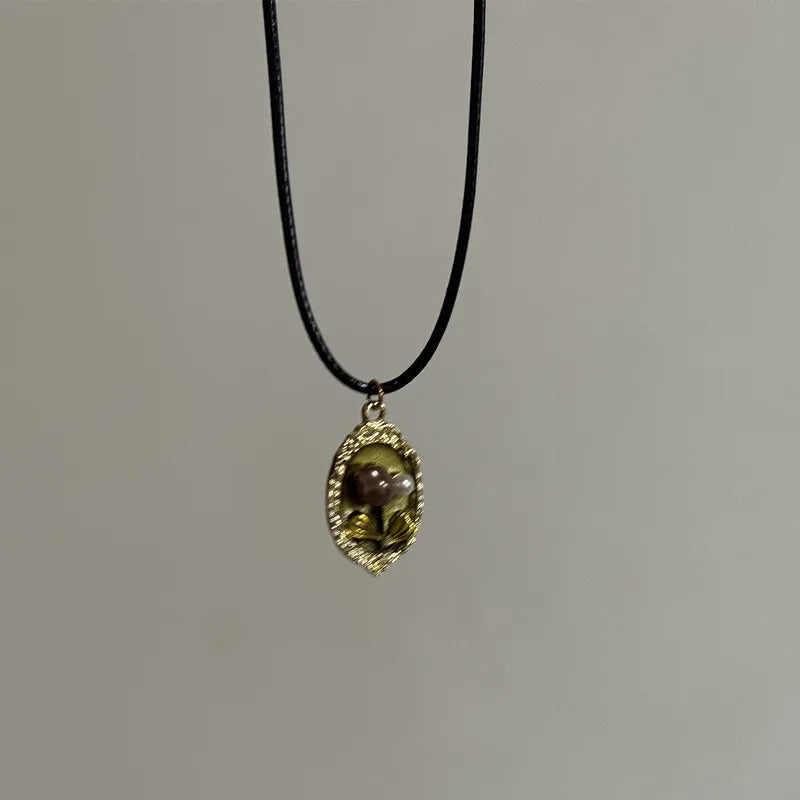 Ingvn  Vintage Drip Oil Flower Sun Pendant Necklace with Leather Rope Unique Antique Style Jewelry Accessory