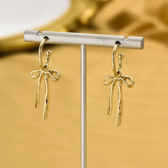 1 Pair of Luxurious Golden Bowknot Drop Earrings - Elevate Your Style with Versatile Design, Perfect for Daily Outfits and Parties - Exclusively for Women Who Appreciate Elegance and Charm