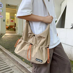 Ingvn  Japan Lightweight Casual Nylon Men Crossbody Bag Women String Tooling Style Tote bag Student Sport Commuter Shoulder Bag